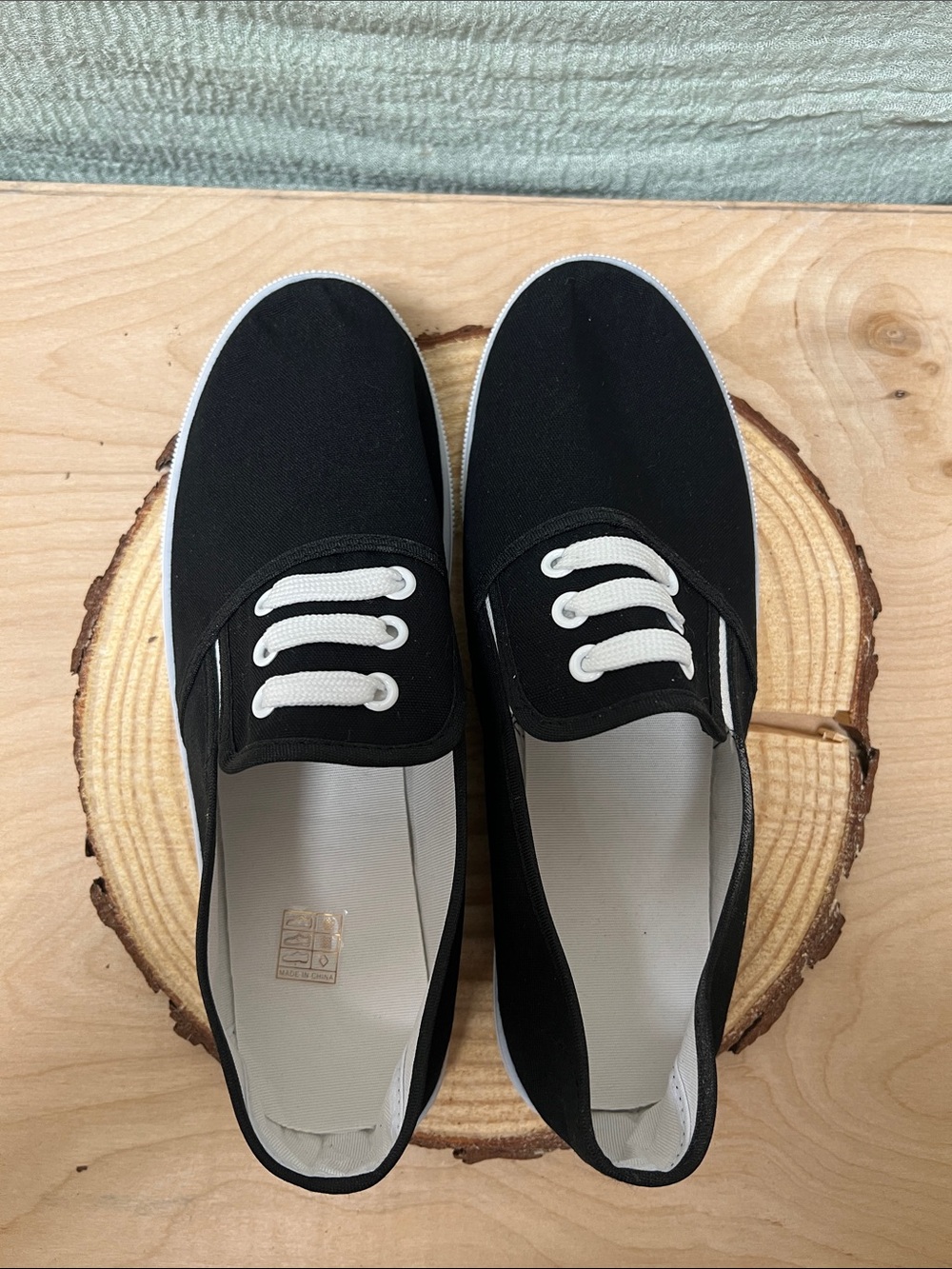 Black Canvas Slip-On Sneakers with White Accents